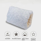Corner pillow with white cover and beige interior on a light gray background, featuring icons and text about product features.